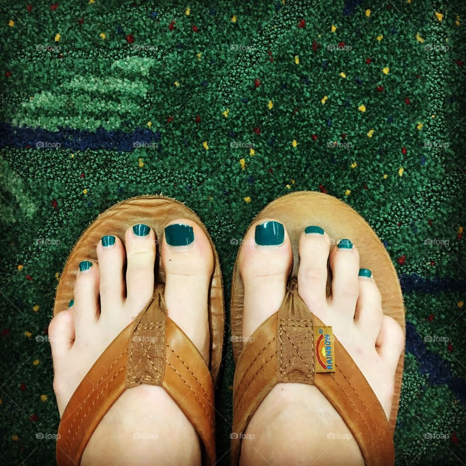 Green toes on the PDX carpet 