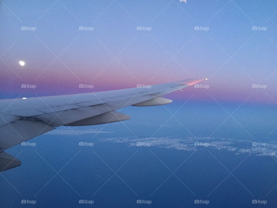 Sunset from the window of a plane