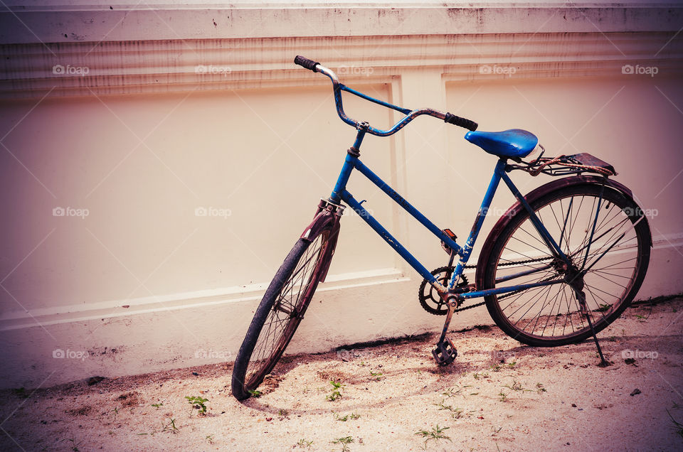 Old bicycle. Old bicycle vintage tone
