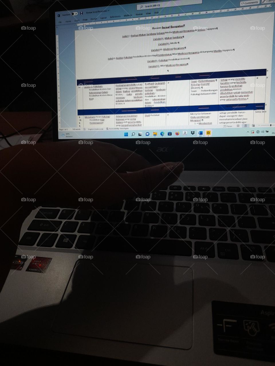 dark shadow hand playing keyboard computer