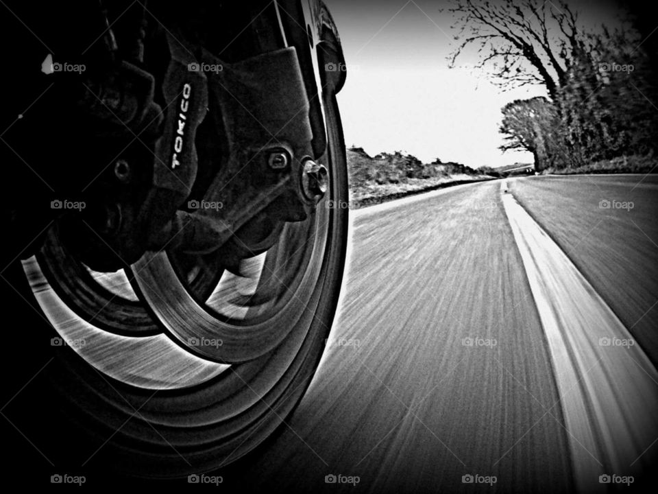 motorcycle wheel on road