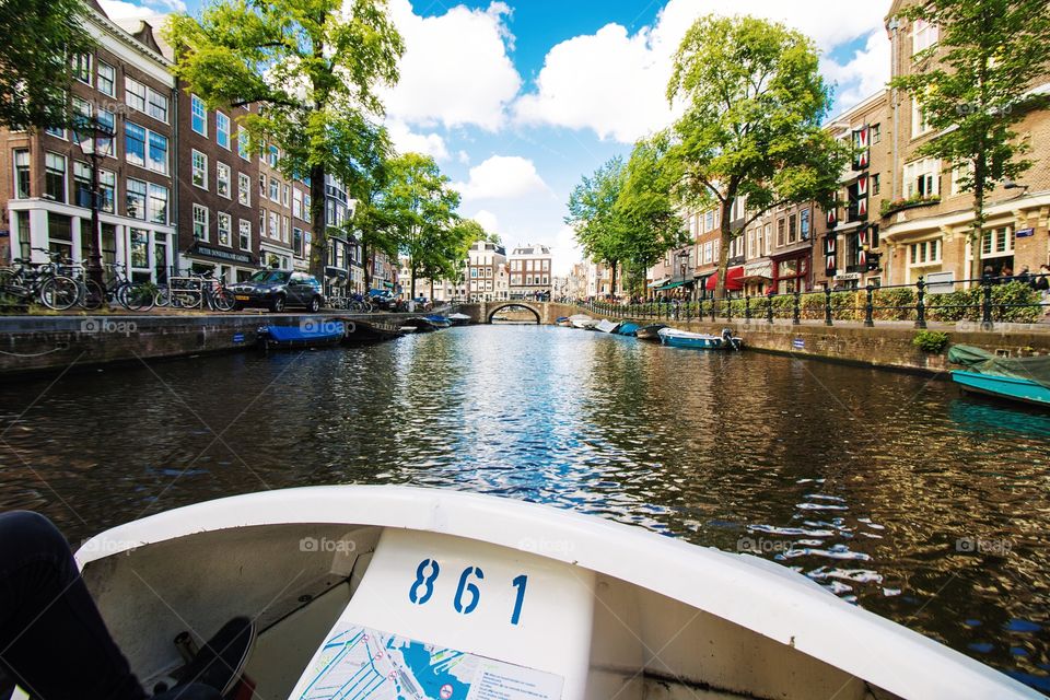 Riding a boat bike through the canals of Amsterdam