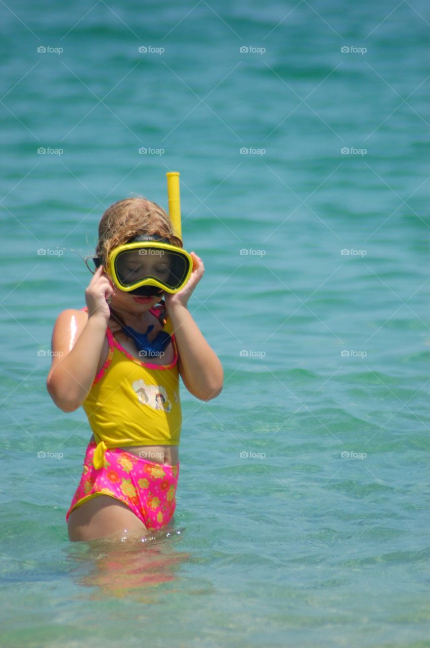 Little girl snorkeling 