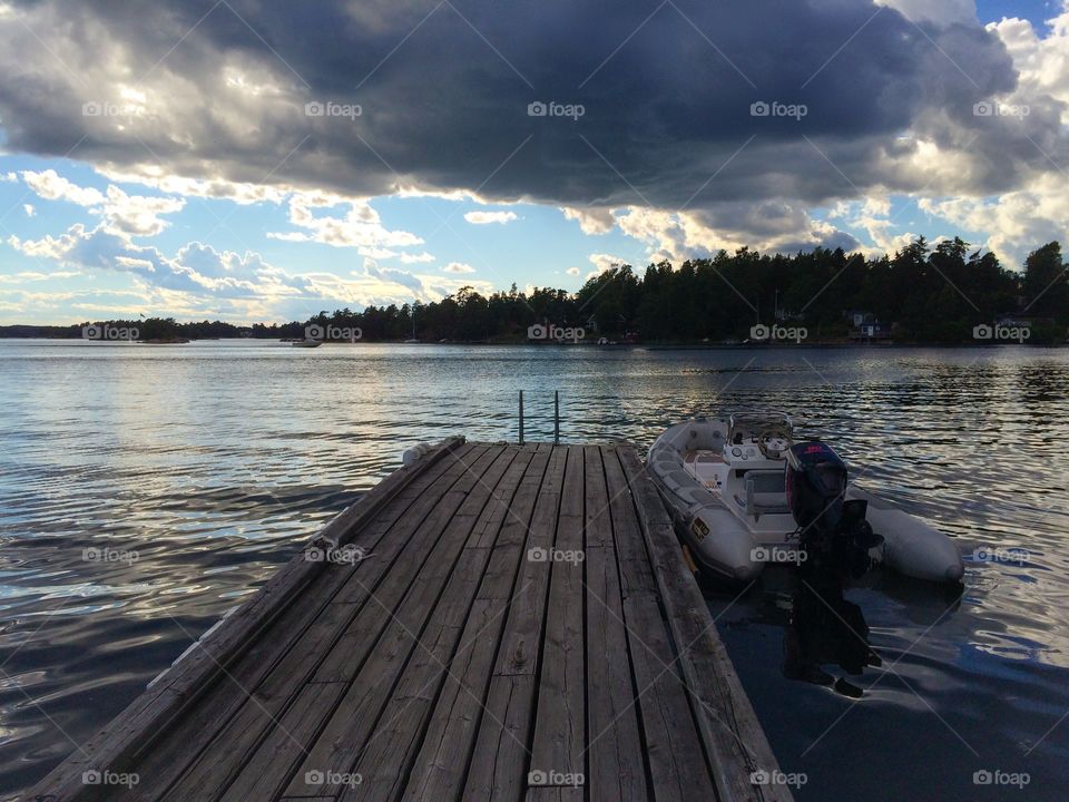 Stormy clouds reflected on lake