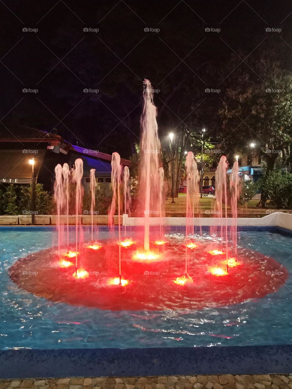 A color fountain in a public square, Praça Pádua Salles, Amparo-SP