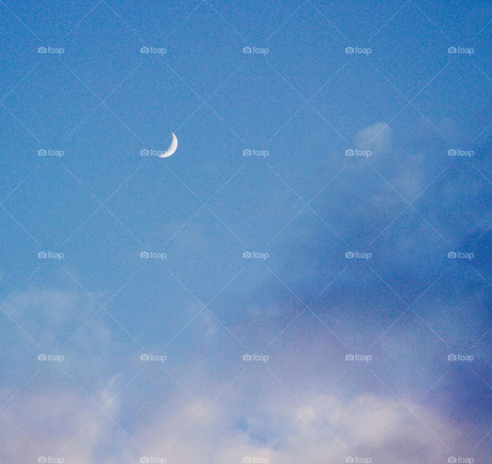 Minimalistic Snaps - crescent  moon rising over thin clouds