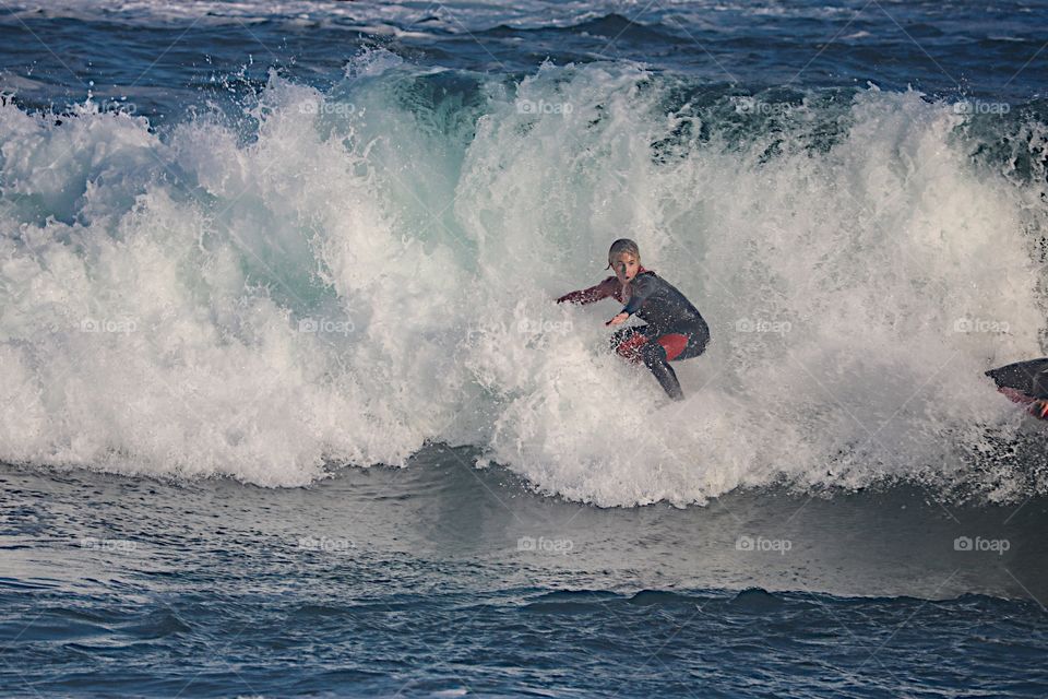 Surfer riding a big wave at The Wedge, Newport Beach, CA
