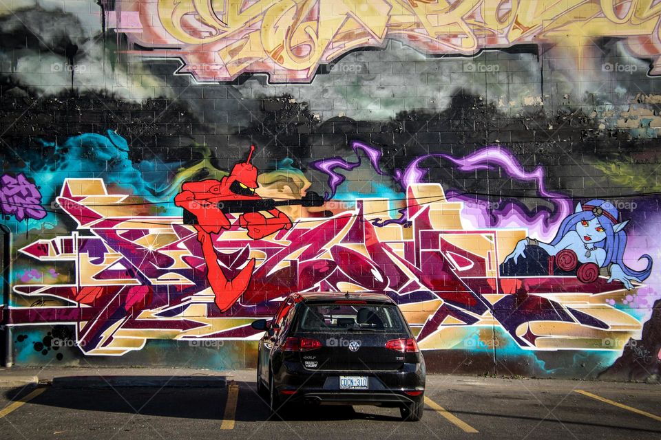 Volkswagen car on a parking with graffiti