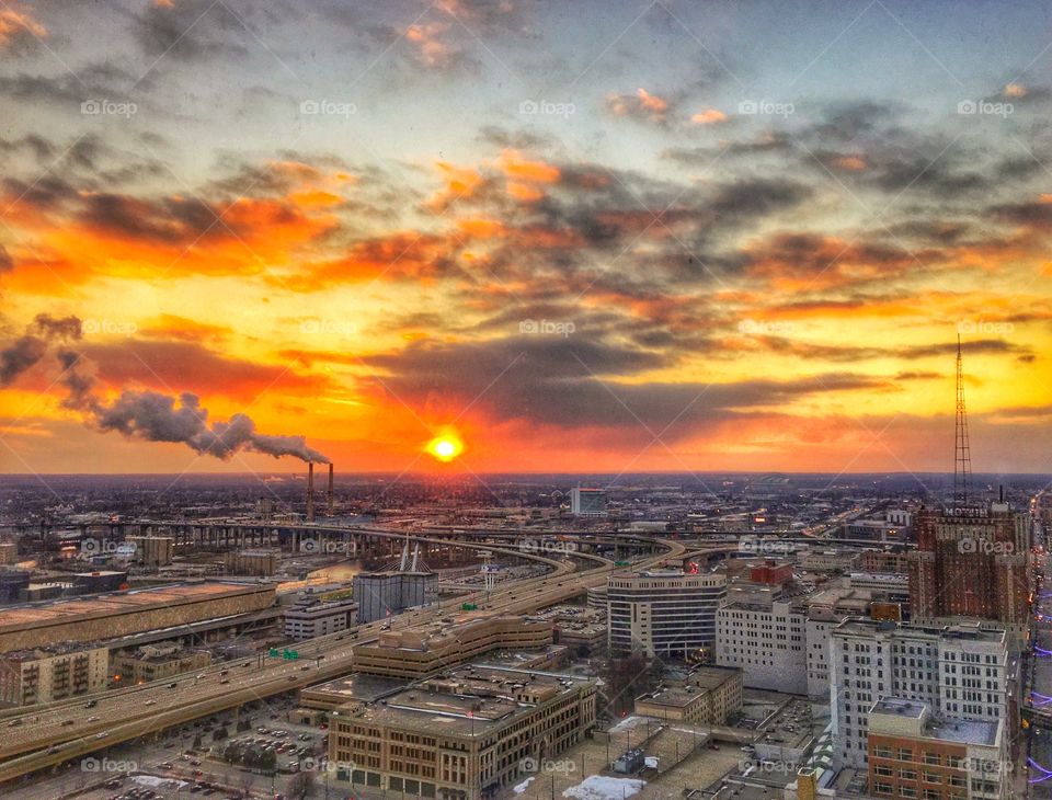 View of chimney in the city during sunset
