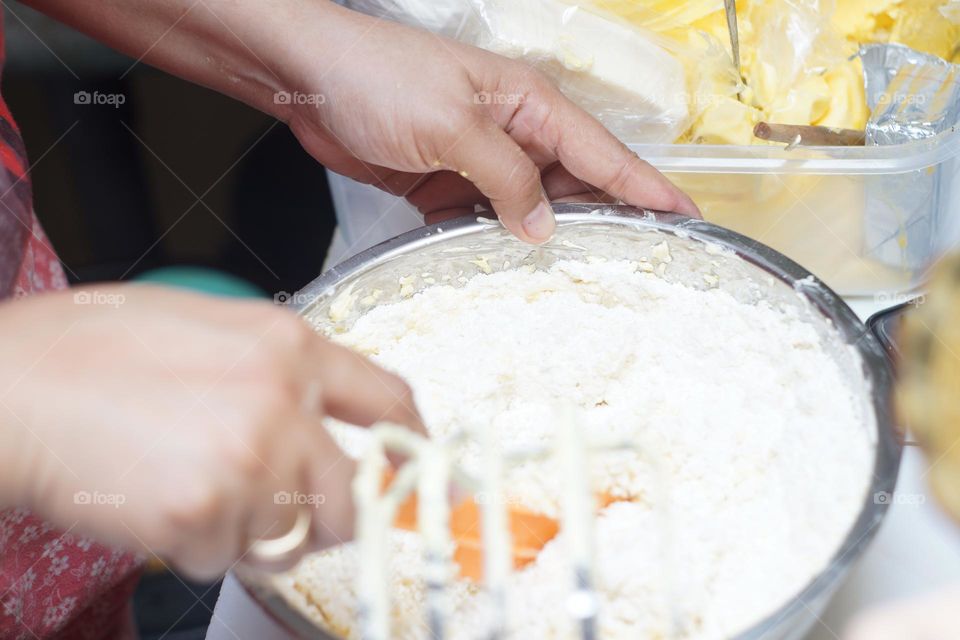 softening the dough using a mixer is one of the processes of making bread