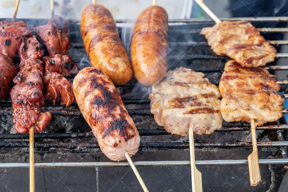 Thai street food , Delicious Grilled sausage and pork