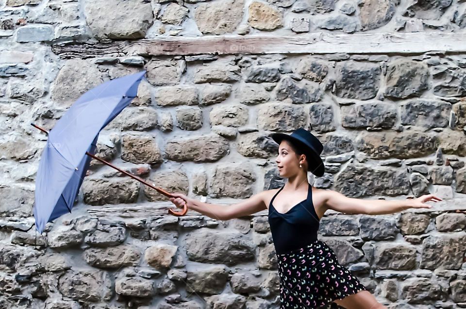 Beautiful Young Girl Posing with Umbrella