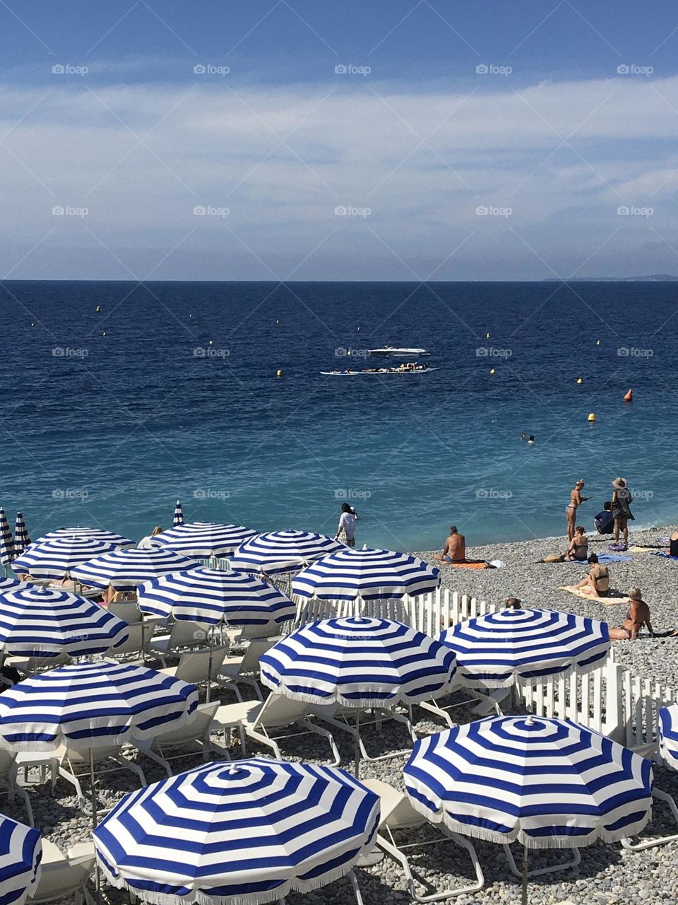 Parasol on beach, sea and blue sky