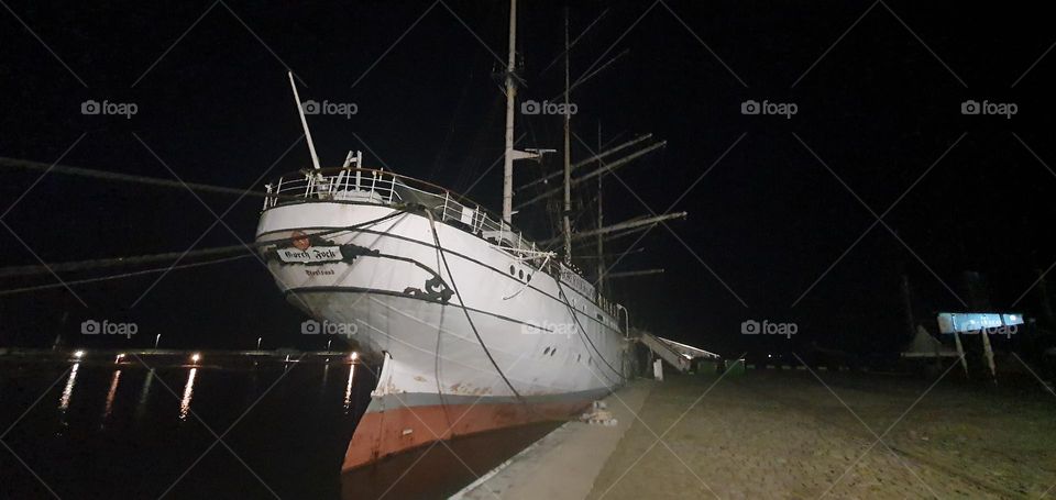 Old tall ship in a harbour