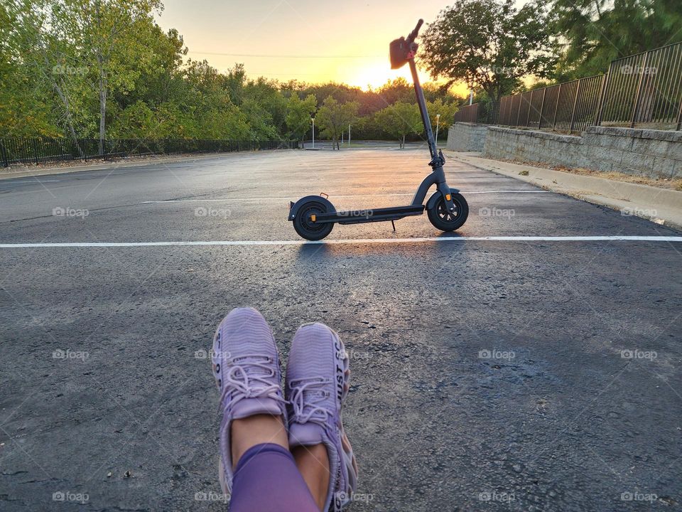 Scooter solitude  violent sunset