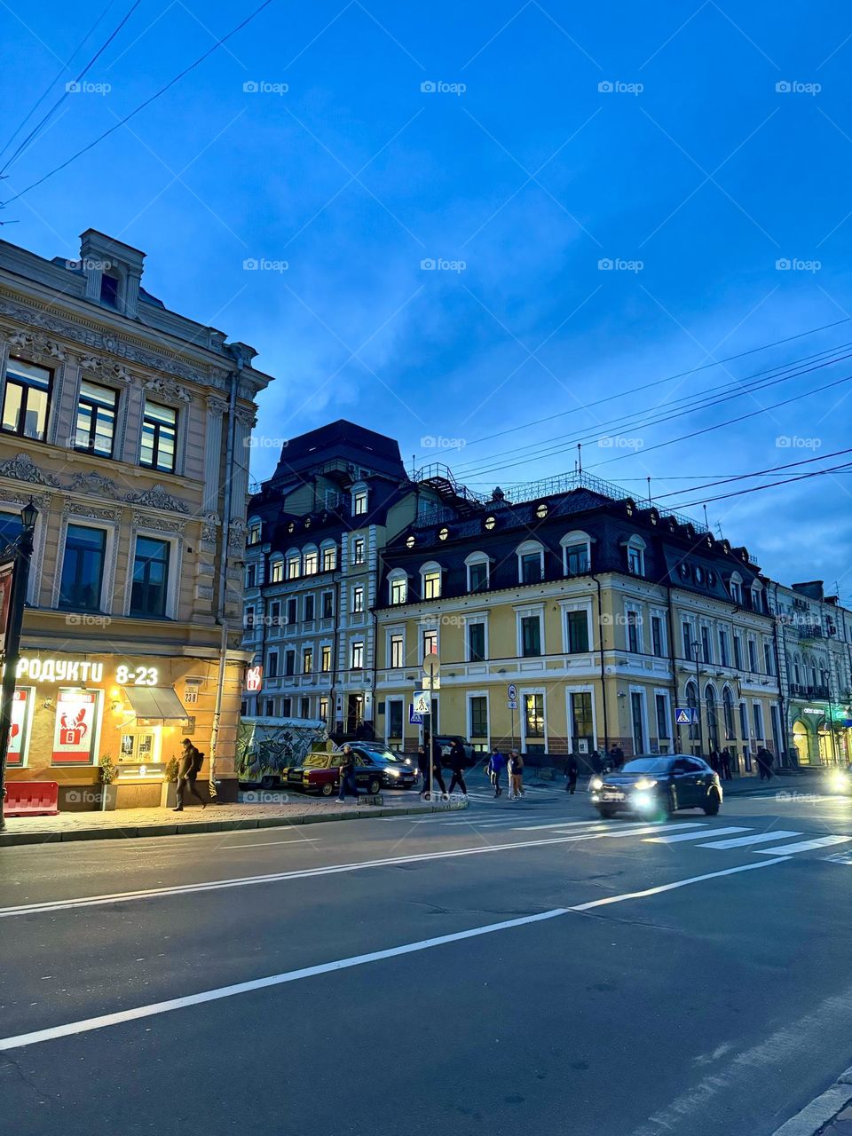 Evening Kyiv with cozy streets with luminous windows