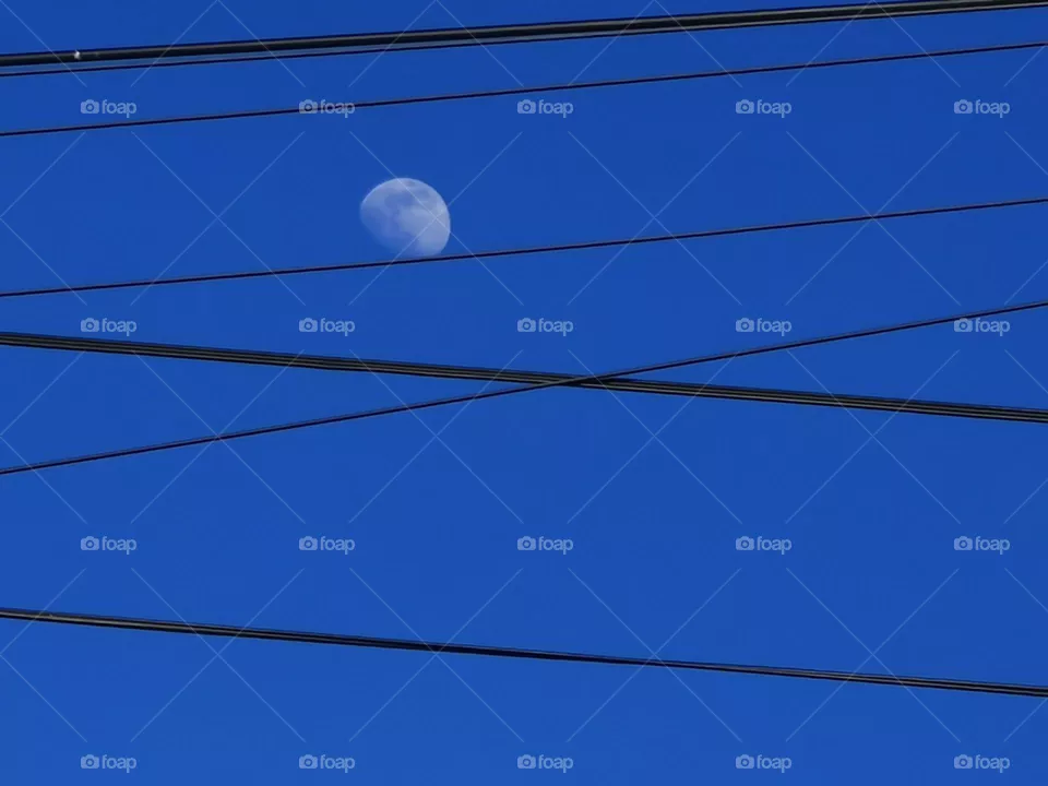 Weary moon resting down