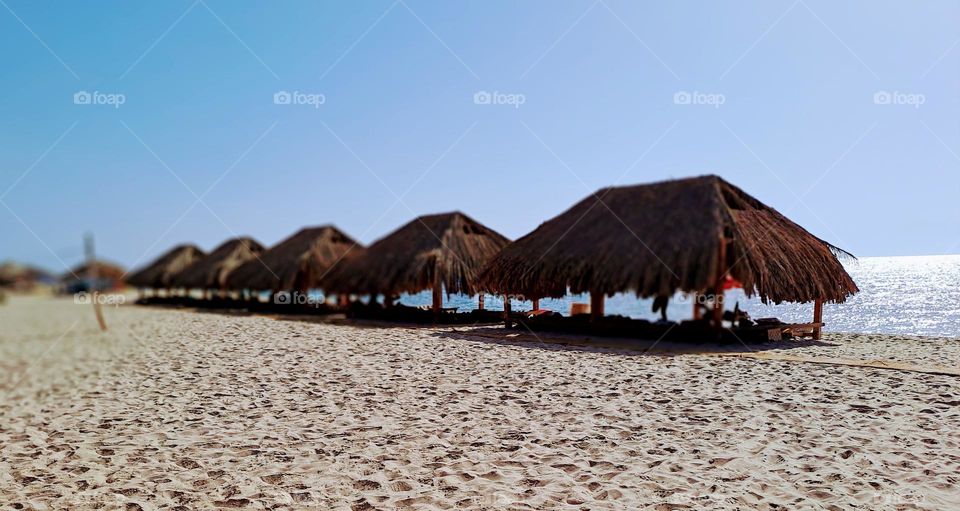 bungalows on the beach in Sinai Egypt on a sunny day