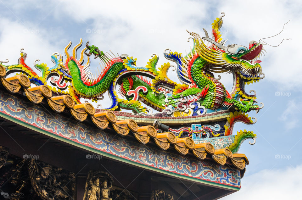 "Enter the dragon"

http://www.picardo.photography/Portfolio/Cityscapes/i-Xdn5F83/A

The main entrance at the Kwan Tai Temple is decorated with beautiful and colorful sculptures of dragons, at Chinatown, Yokohama, Japan. Worth while the visit!