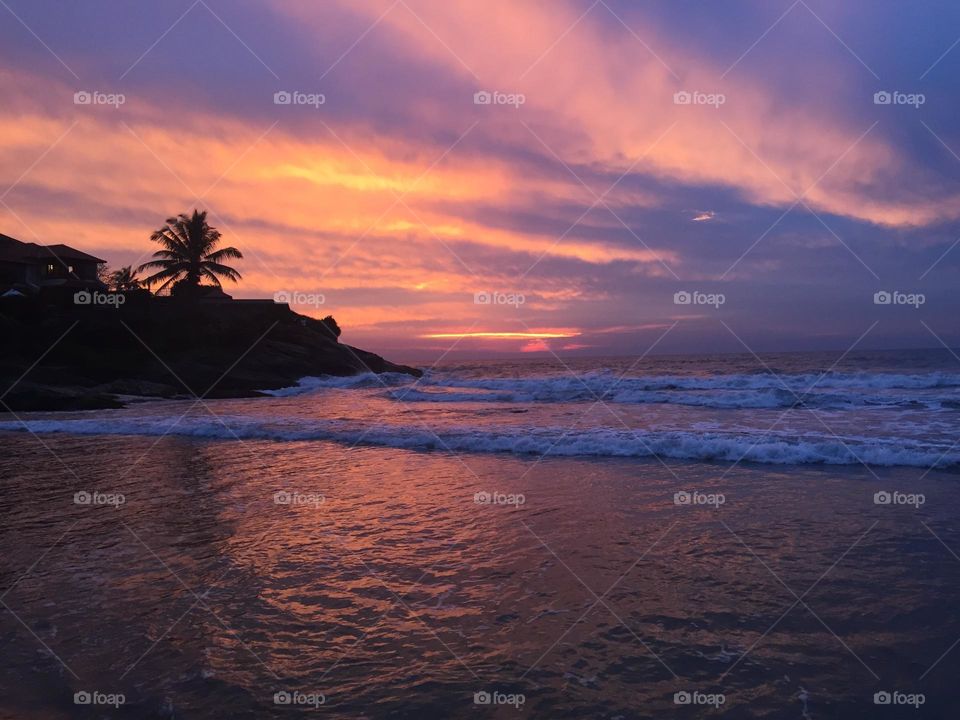 Purple sunset on the tropical beach 