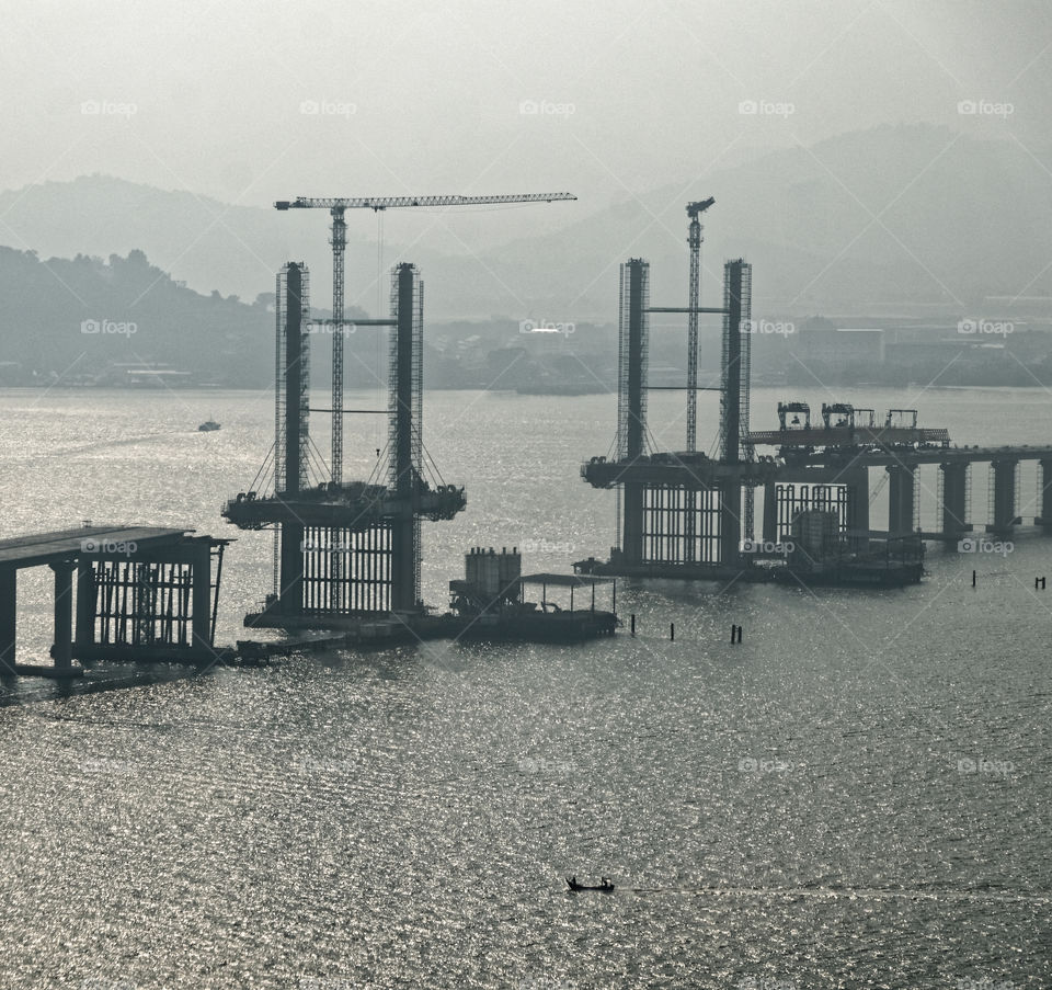 Suspension bridge sea crossing under construction