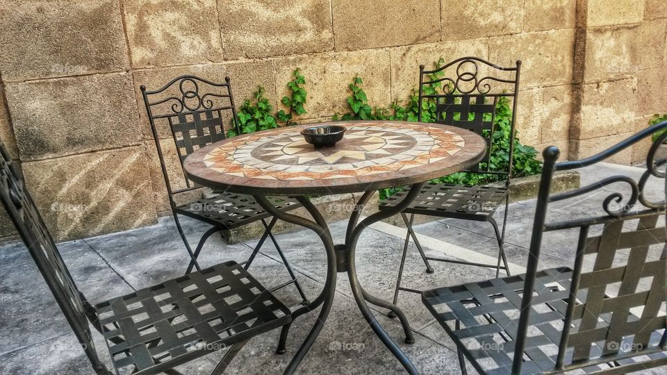 Empty table and chairs