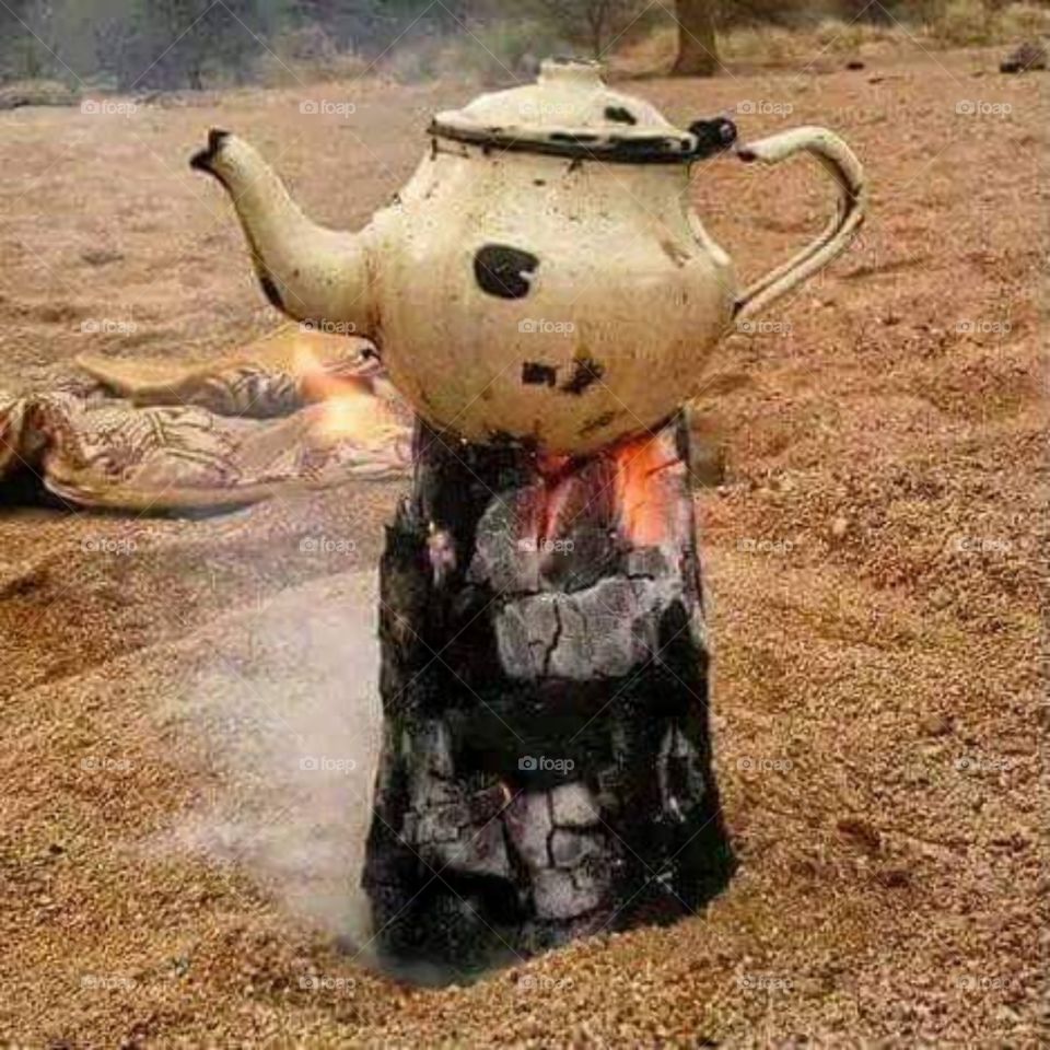 prepare tea on black coal