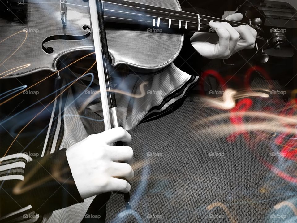 BW sound and light. Hands Playing Violin. 