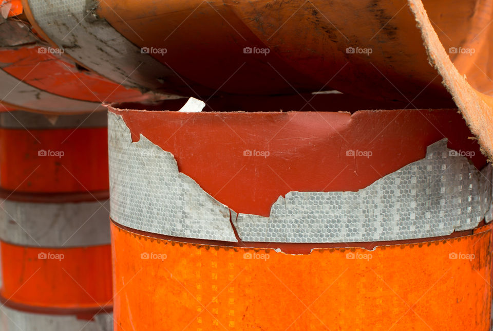 Pile of orange construction pilon and cones