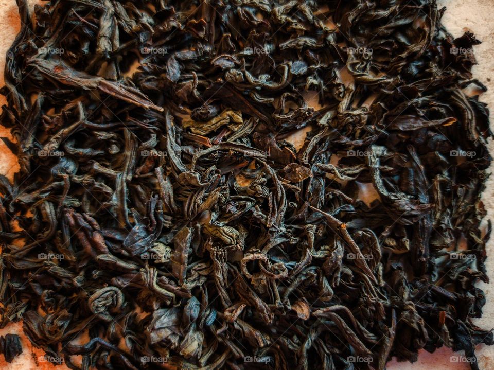 Black leaf tea.