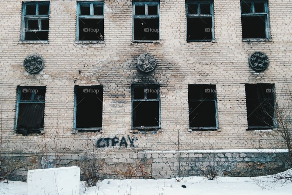 facade of an old abandoned building in Kiev