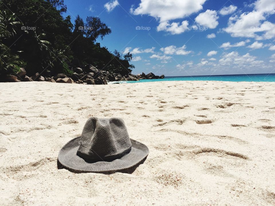 Sun hat on sand