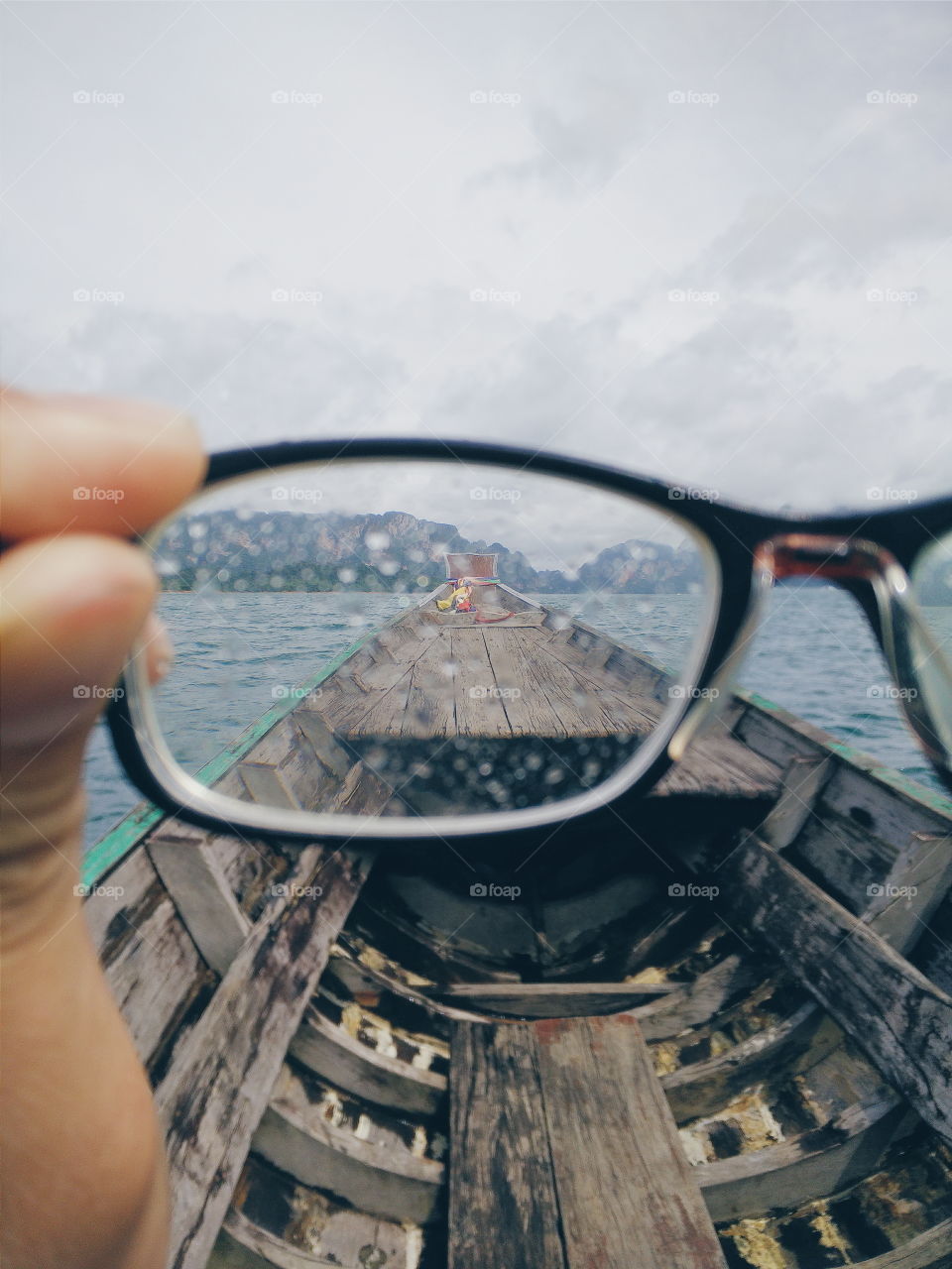 Look it through your eyes. I got this view from Cheow Lan Dam (Ratchaprapa Dam) in Thailand.