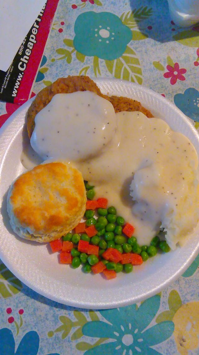Mmmmmmmmmm country fried steak with sausage gravy, biscuit and veggies!!