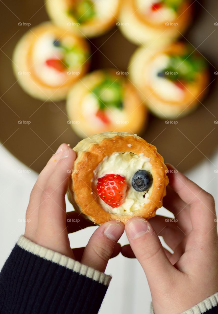 Girls holding a cupcake