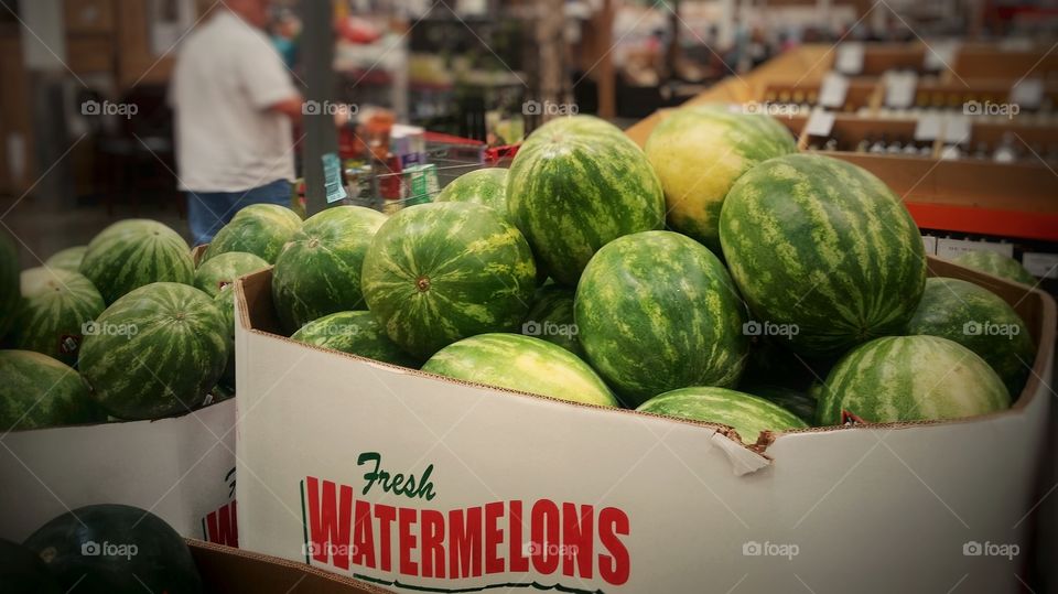 Fresh watermelons at the grocery store summer memories