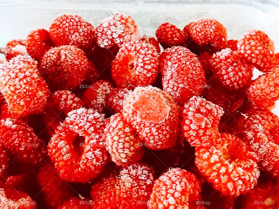 Close-up of frozen raspberry