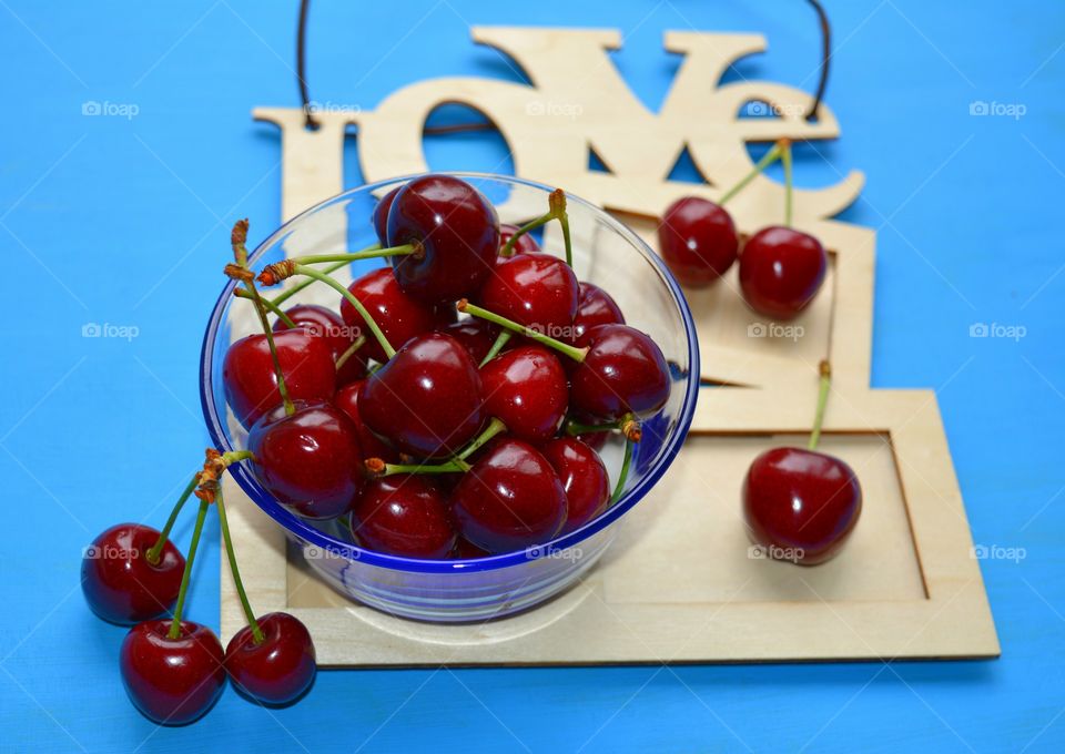 red cherry tasty love summer food top view table blue background