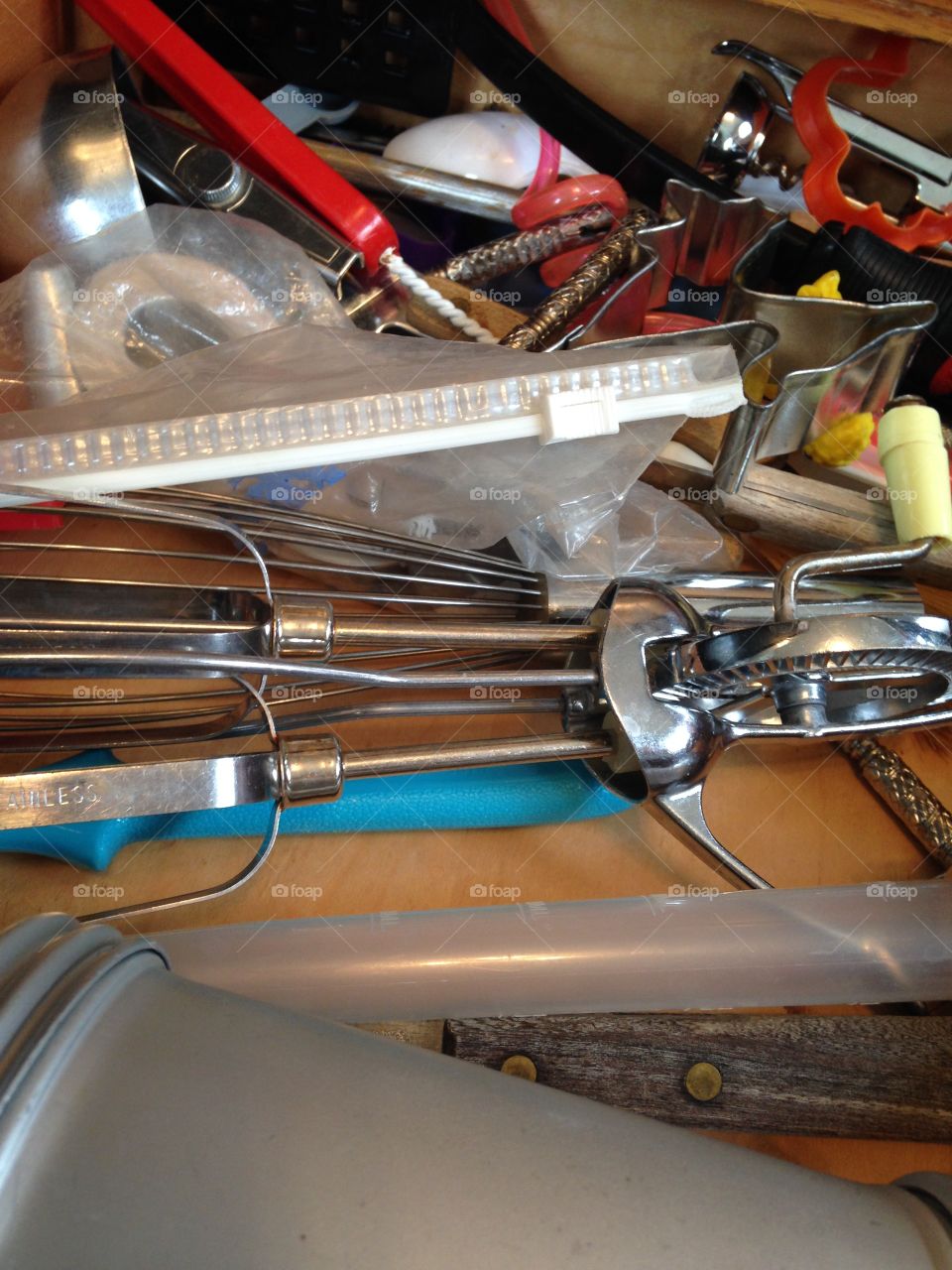 Cooking utensils in a messy drawer