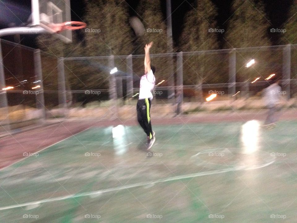 Play basketball and jump 