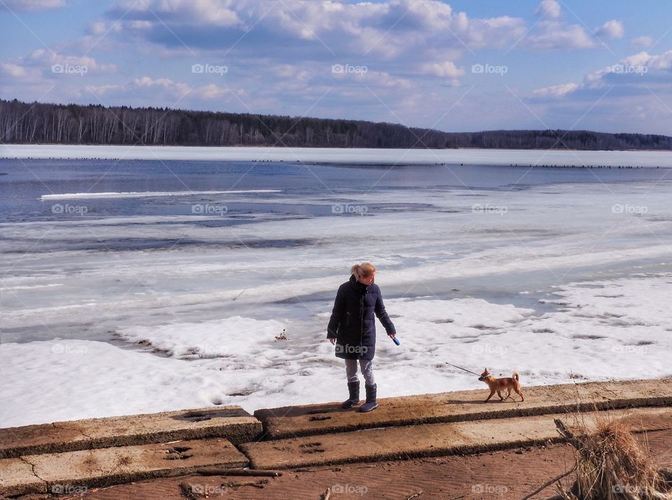 Walking the dog on a frozen lake