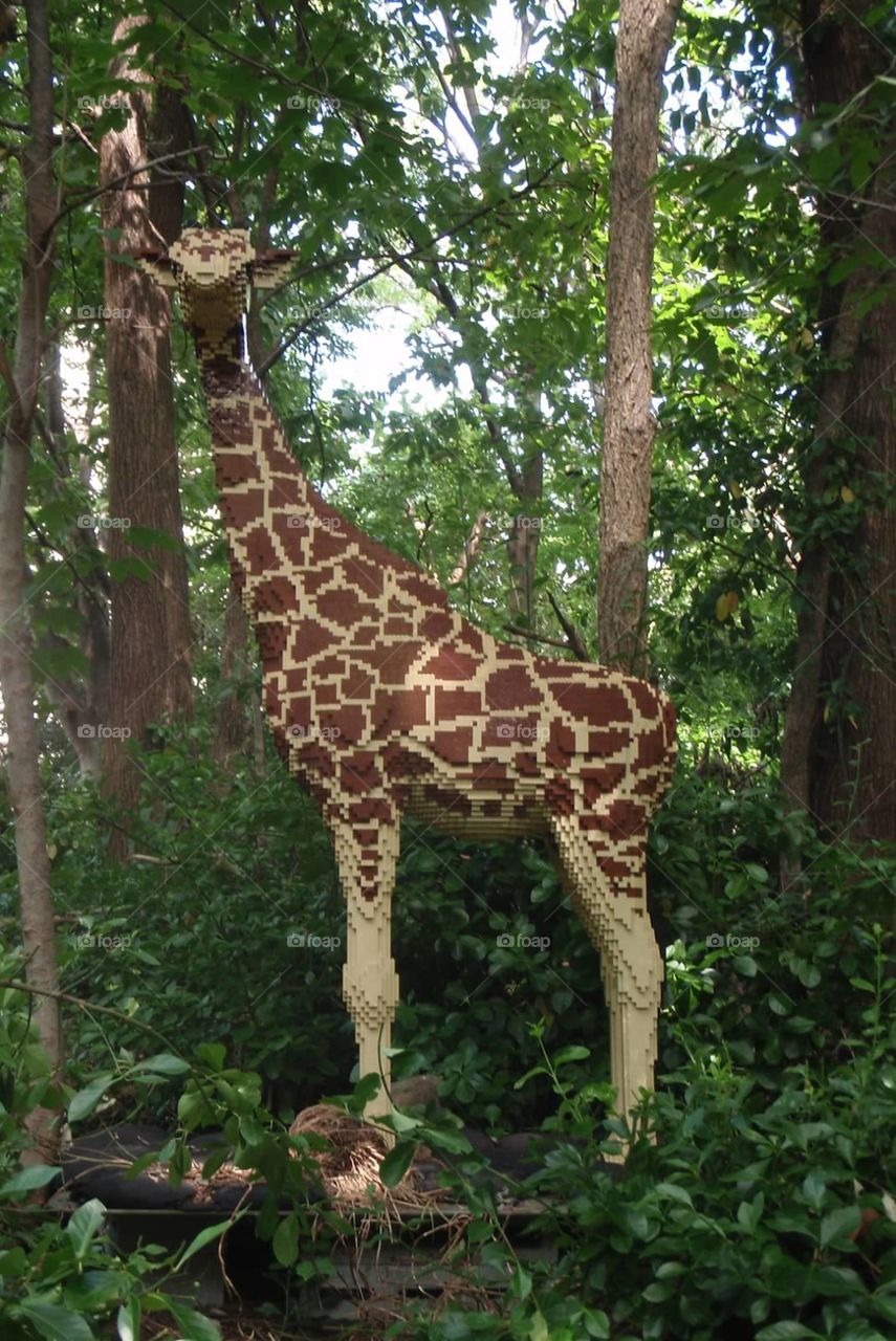 Giraffe made of Legos at the zoo