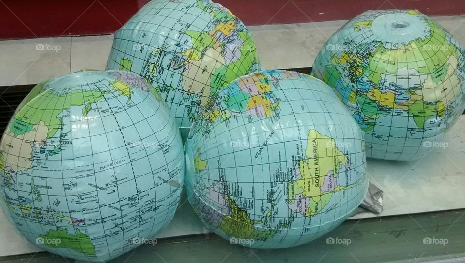 Plastic world globes. on Display NYC