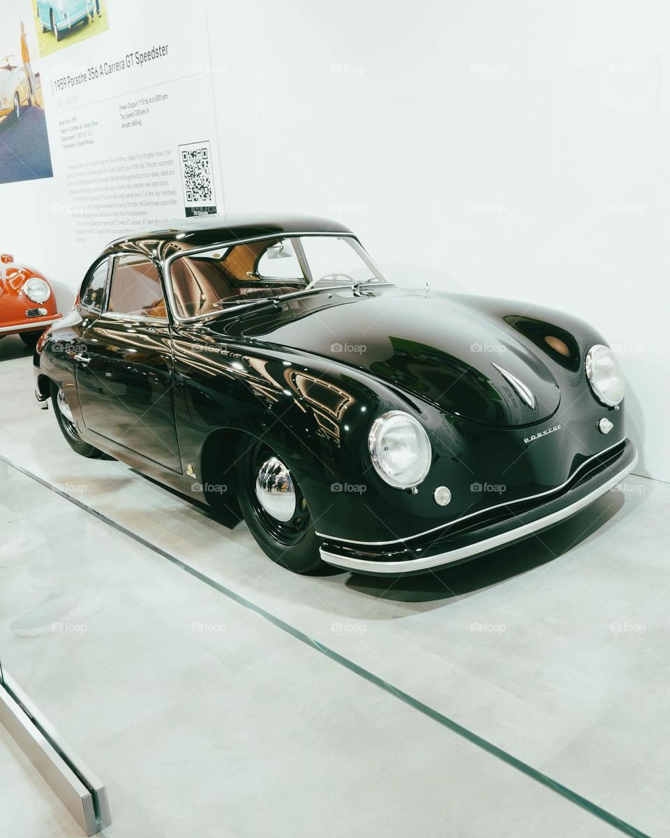 Black porsche.  Classic car.  The car that started it all.