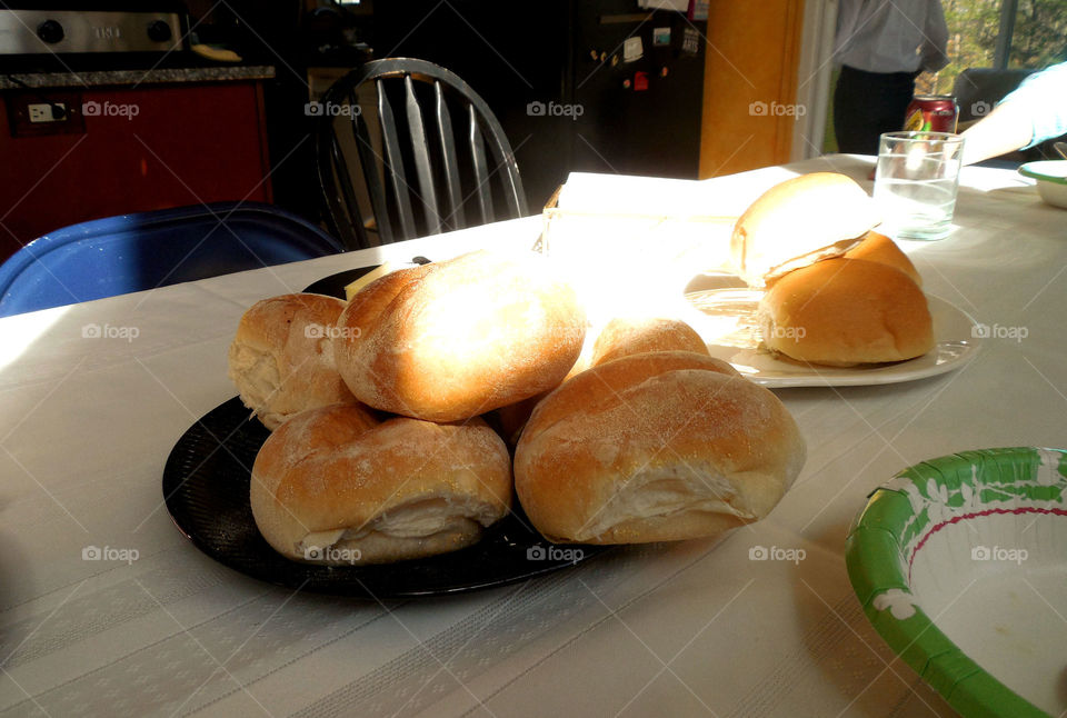 Bread rolls. Sunlight seeping in 