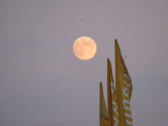 full moon and flags