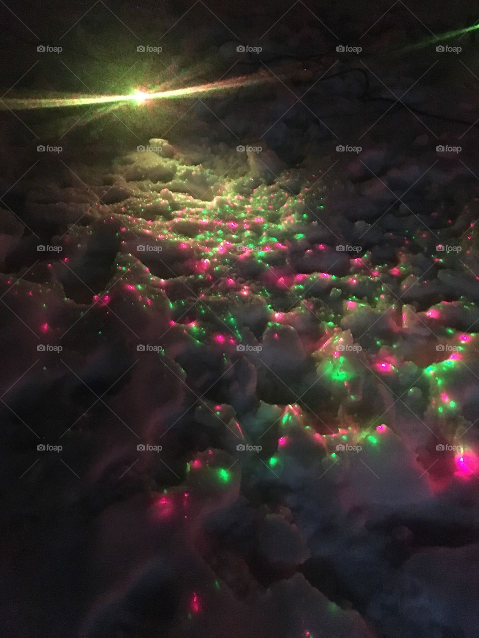 Christmas lights on the snow 