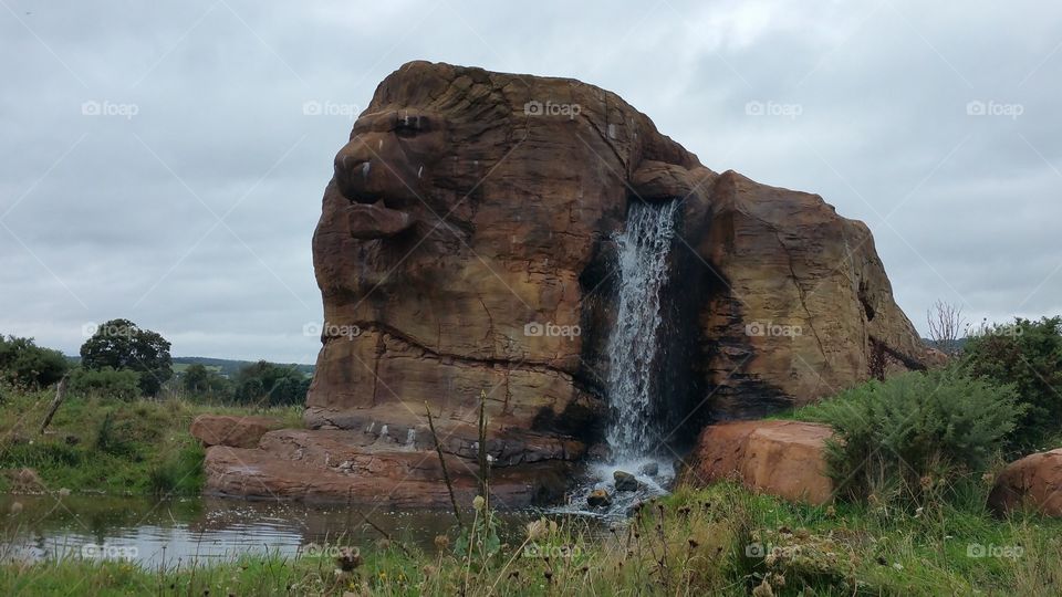 Carved lion in a rock