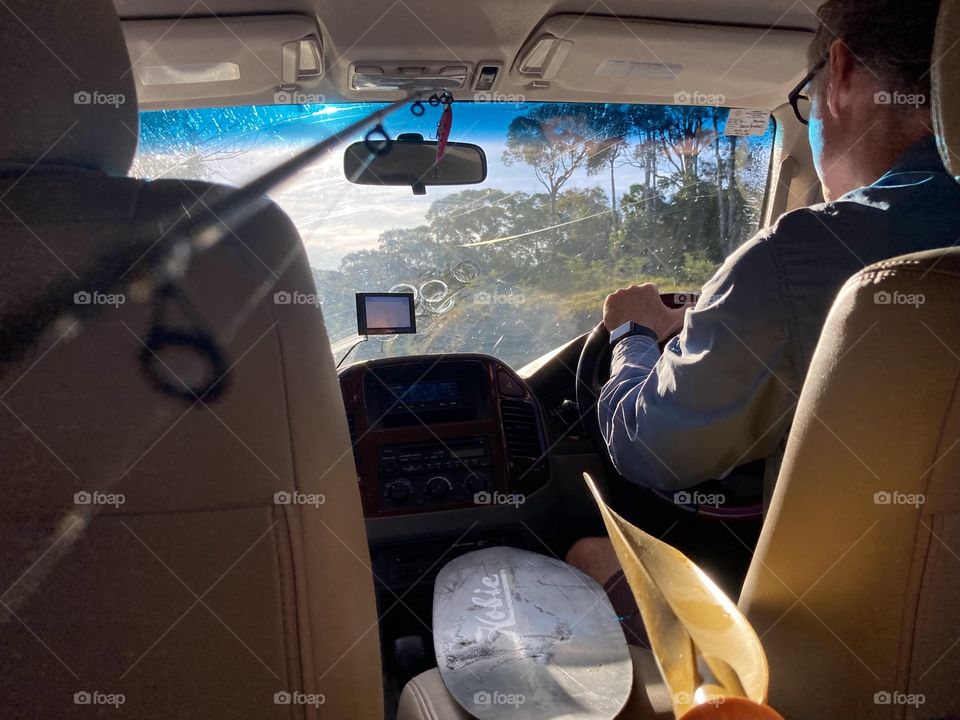 On the road: backseat perspective preparing for a kayaking trip on the Australian coast,