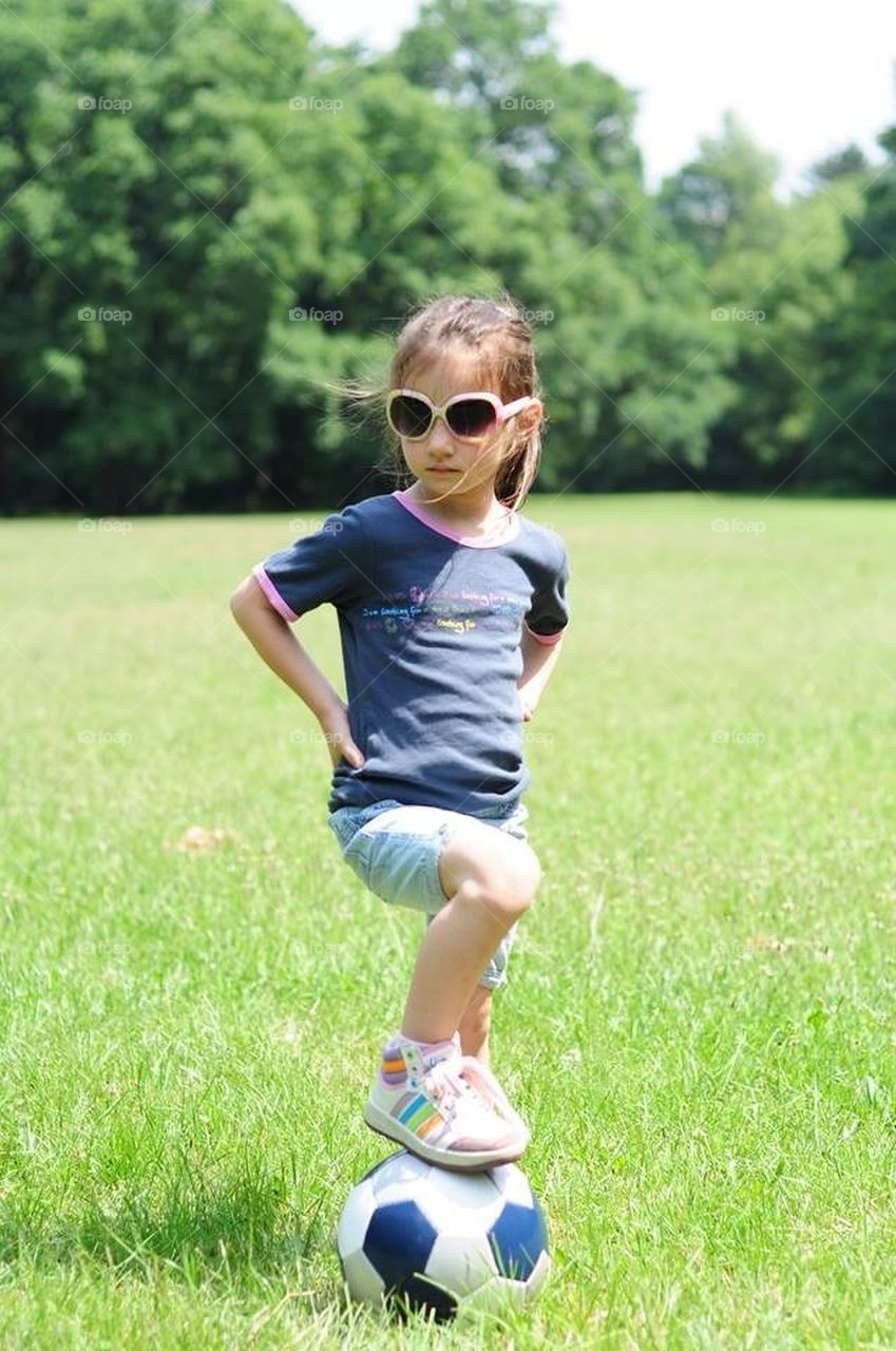 Girl playing football 